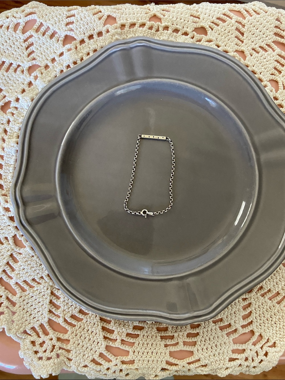 Sterling silver rolo link bracelet with inscription Dream Deep Reach High